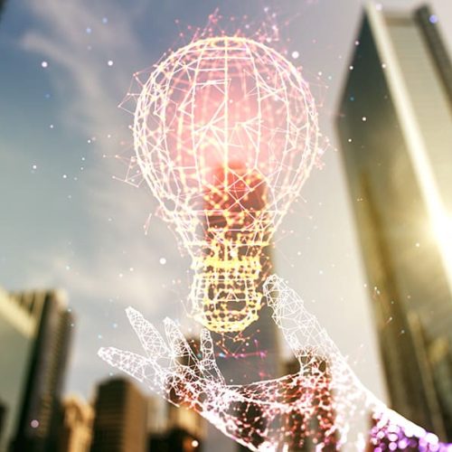 double-exposure-creative-light-bulb-hologram-modern-skyscrapers-background-research-development-concept